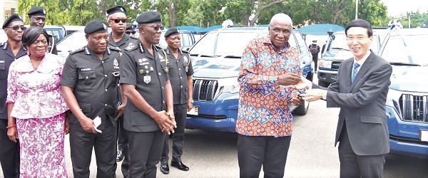 Mochizuki Hisanobu (right), the Japanese Ambassador to Ghana, handing over the keys to the vehicles to Ambrose Dery (2nd from right), the Minister for the Interior. Looking on are Adelaide Anno-Kumi (left), Chief Director, Ministry for the Interior, and Dr George Akuffo Dampare (3rd from right), the Inspector-General of Police. Picture: ELVIS NII NOI DOWUONA